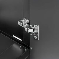 Close Up View Of A Soft Close Hinge Securing A Cabinet Door To Its Frame
