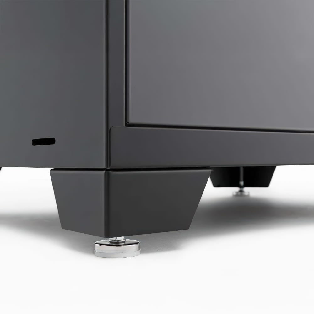 Close Up View Of Cabinet Base Showing Adjustable Leveling Feet And Modern Black Metal Finish