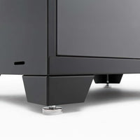 Close Up View Of Cabinet Base Showing Adjustable Leveling Feet And Modern Black Metal Finish