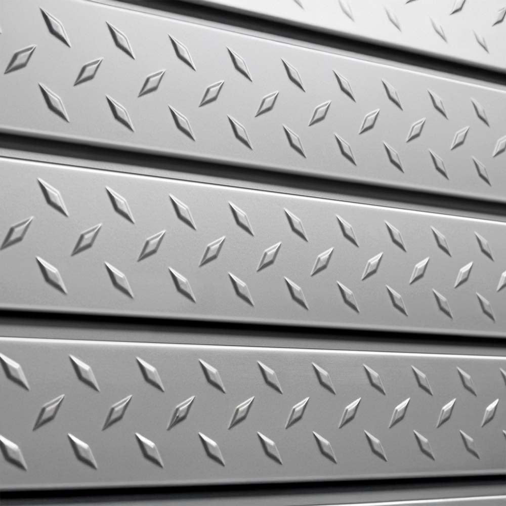 Close Up View Of Embossed Diamond Plate Pattern On Silver Slatwall Panels
