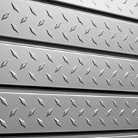 Close Up View Of Embossed Diamond Plate Pattern On Silver Slatwall Panels