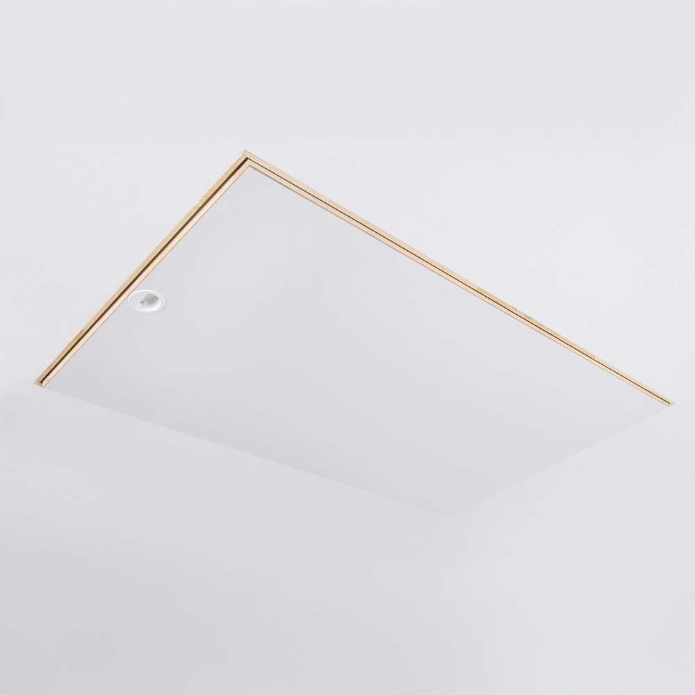 Closed Attic Hatch With A Clean Flush White Panel Bordered By Natural Wood Trim