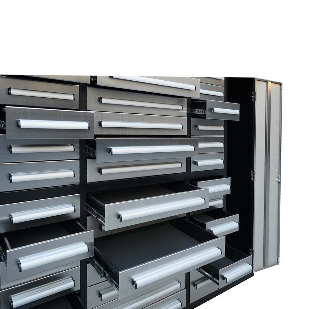 Closeup Of A Multi Drawer Tool Cabinet With Several Drawers Pulled Out