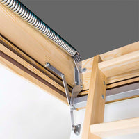Detailed View Of A Wooden Attic Ladder s Hinge And Spring Mechanism