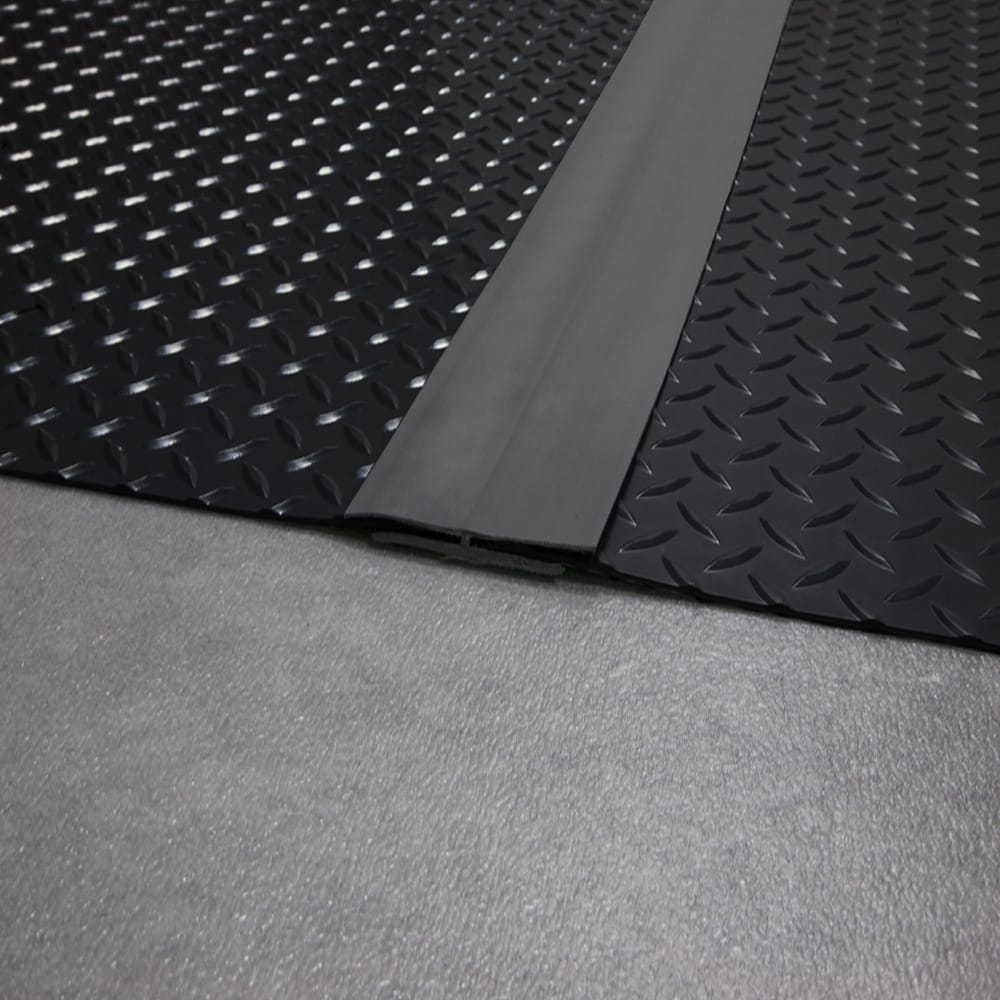 Diamond Plate Textured Surface With G-Floor Center Strip Running Along One Side