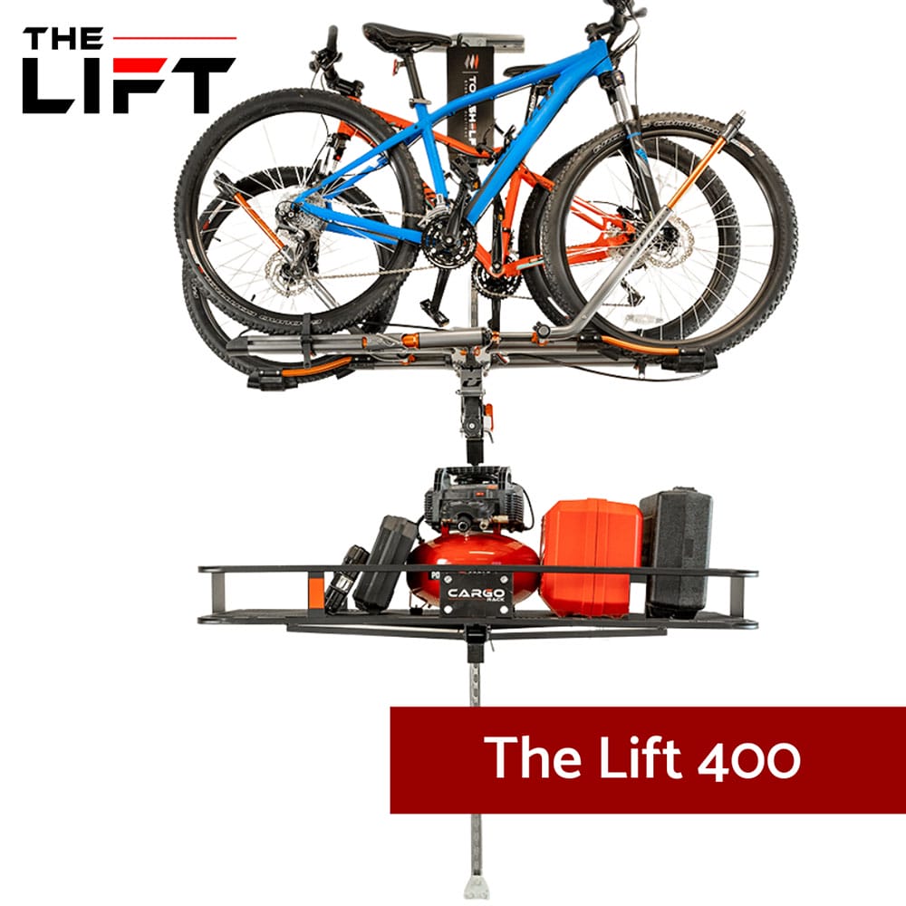 Displays Two Bicycles Mounted On A Robust Lift System Named The Lift 400 Equipped With A Powerful Motor And Additional Cargo Storage