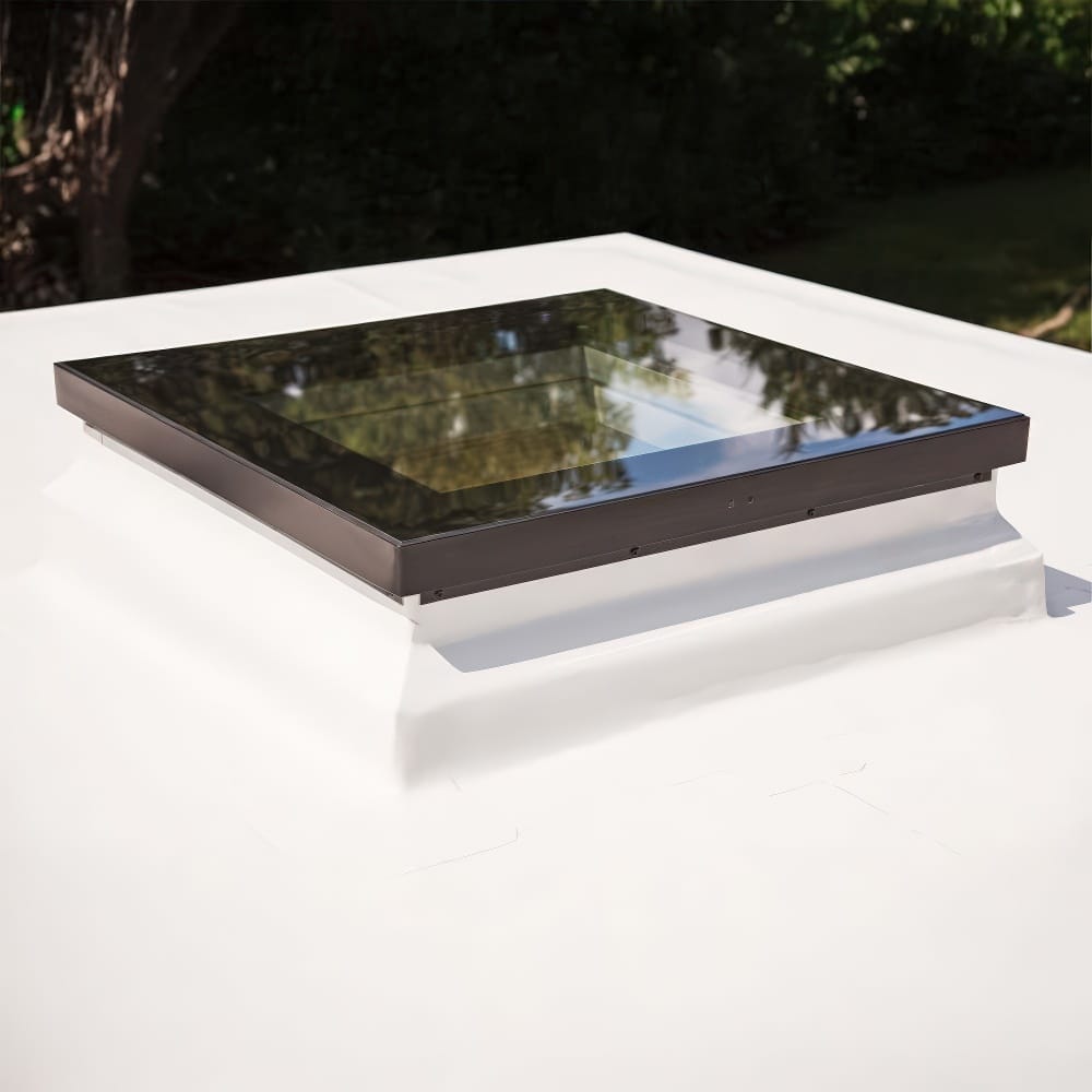 Flat Rooftop Skylight With Black Frame And Tree Reflections On Glass