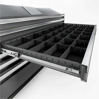 Full Width Drawer With Adjustable Plastic Dividers Extended From Metal Tool Cabinet