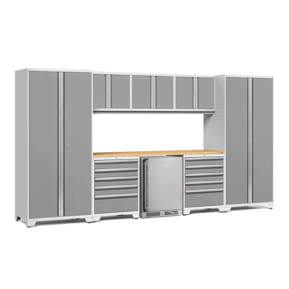 Garage Cabinet Set In Light Gray And White Features Tall Storage Units Upper Cabinets Drawer Modules And A Centrally Placed Beverage Cooler Beneath A Wooden Work Surface