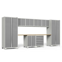 Garage Cabinet System Featuring Tall Lockers Upper Storage Units A Wood Work Surface And A Central Tool Chest