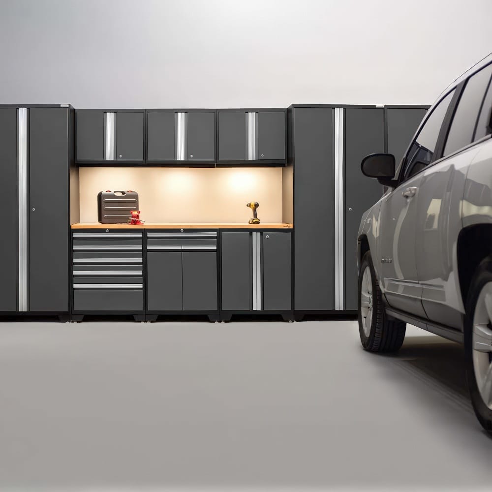Garage Features A Modular Black And Silver Cabinet System With Tall Lockers Wall-Mounted Cabinets A Wood Worktop Under-Cabinet Lighting And A Parked SUV