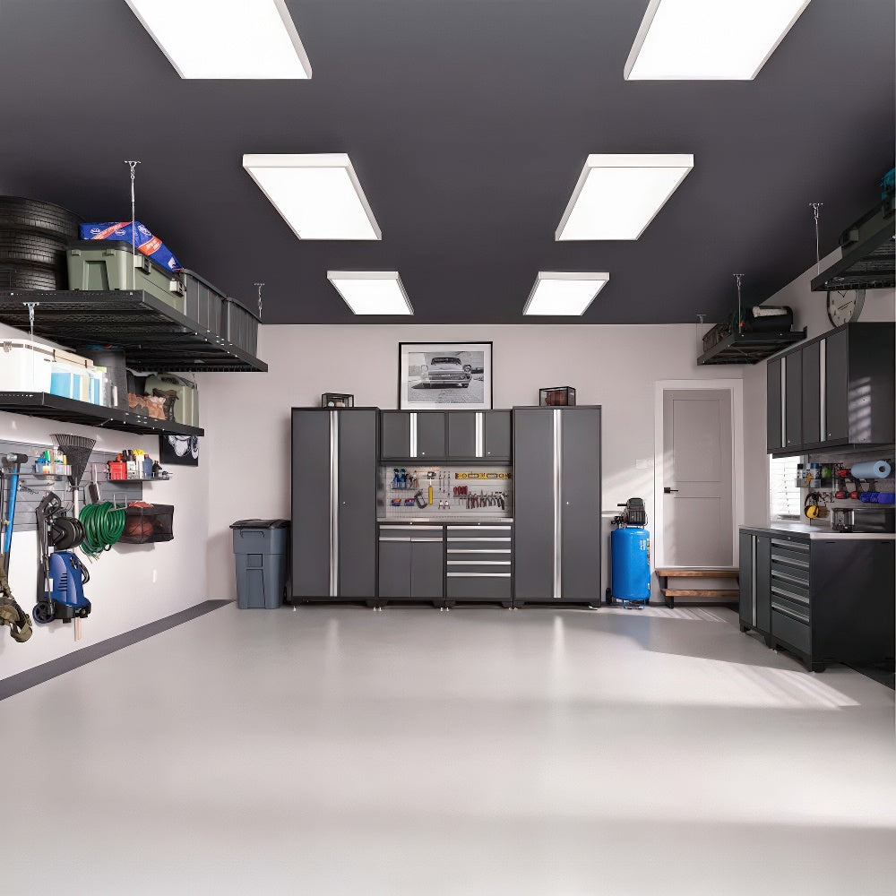 Garage Features Sleek Black-And-Gray Cabinets Wall-Mounted Tools And Overhead Storage Racks