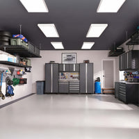 Garage Features Sleek Black-And-Gray Cabinets Wall-Mounted Tools And Overhead Storage Racks