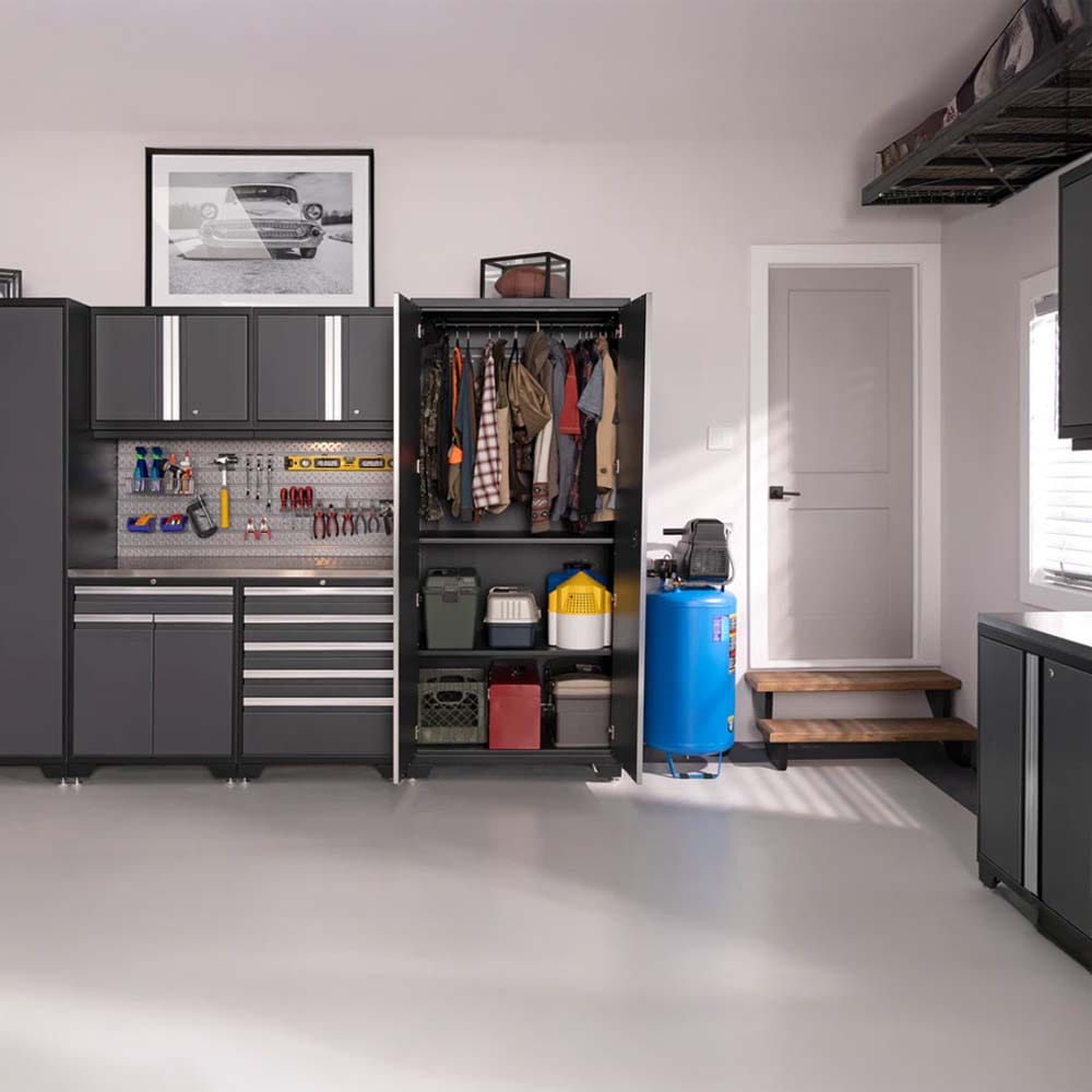 Garage Features Sleek Black Cabinets A Pegboard Tool Wall And A Tall Storage Unit Neatly Arranged With Clothes