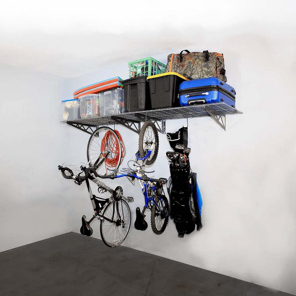 Garage Storage Setup With Wall-Mounted SafeRacks 24x48 Shelves Holding Various Containers And Luggage