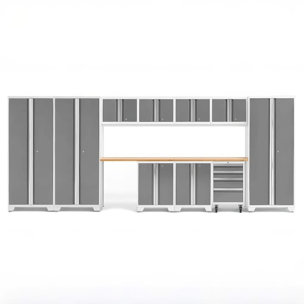 Garage Storage System With A Clean White Frame Matte Grey Cabinet Doors A Light Wood Worktop And A Mobile Tool Drawer