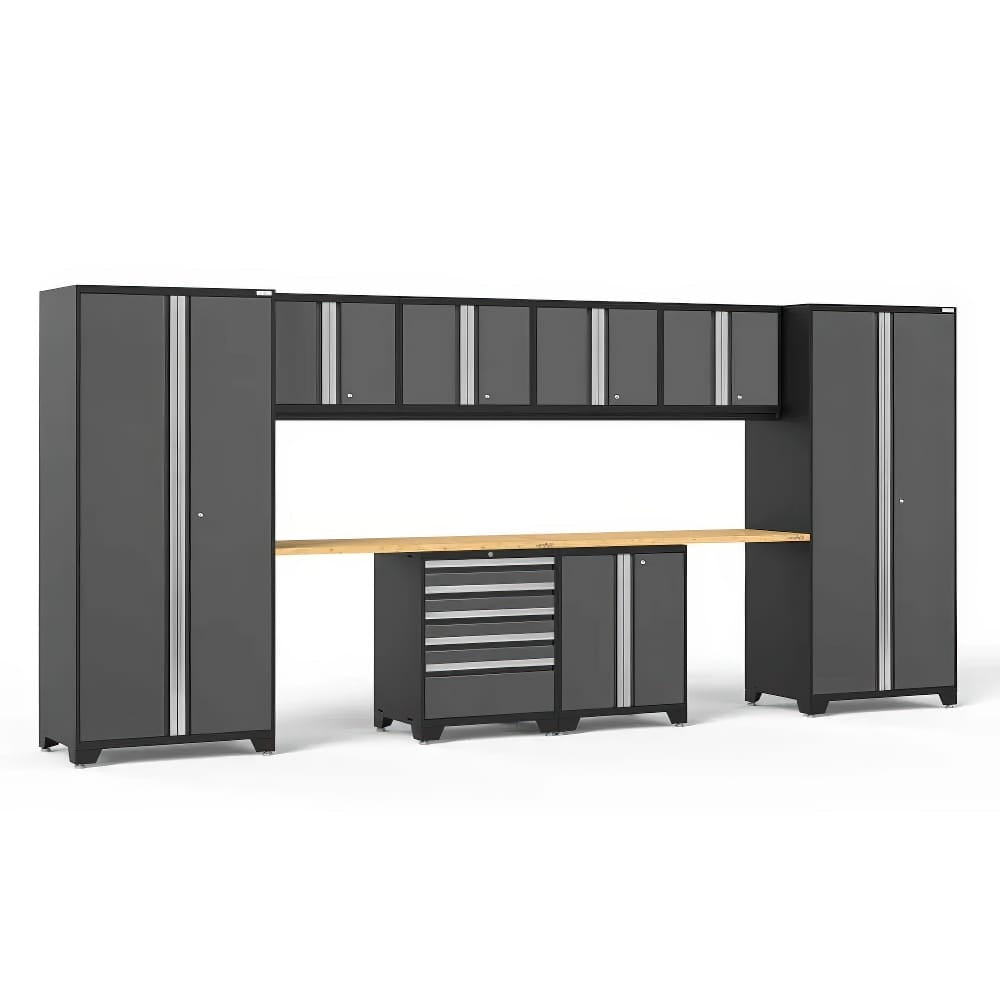 Garage Storage System With Two Tall Cabinets Multiple Upper Wall Cabinets A Wood Worktop And A Central Tool Chest