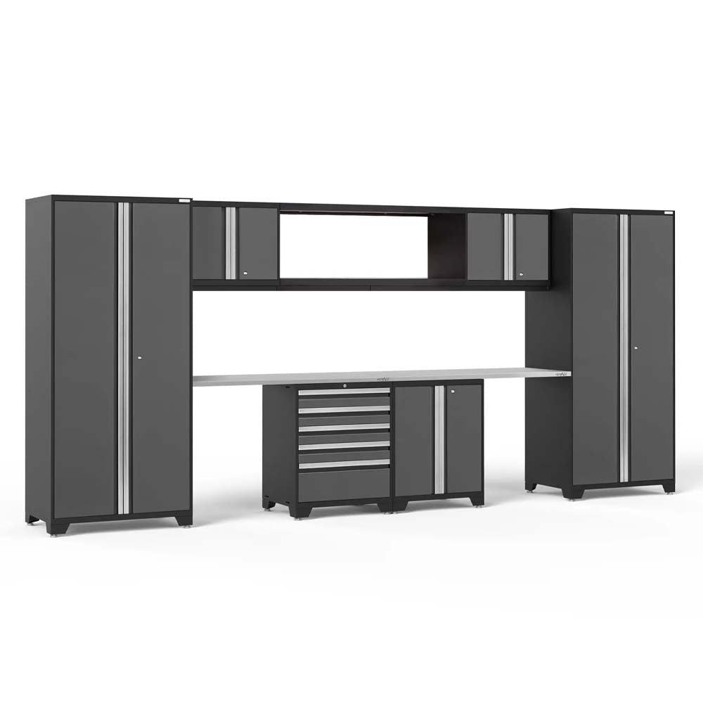 Garage Storage Wall With Tall Cabinets Upper Cubbies And Central Tool Drawer Workstation