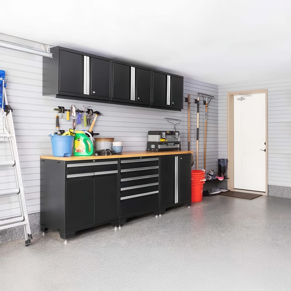 Garage Workspace With Black Wall Cabinets Slatwall Storage Wood Top Base Cabinets And Tools By White Door And Ladder