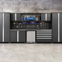 Garage Workstation With Dark Cabinets Slatwall Tool Display Wood Workbench Drawer Bank And Built In Stainless Mini Fridge