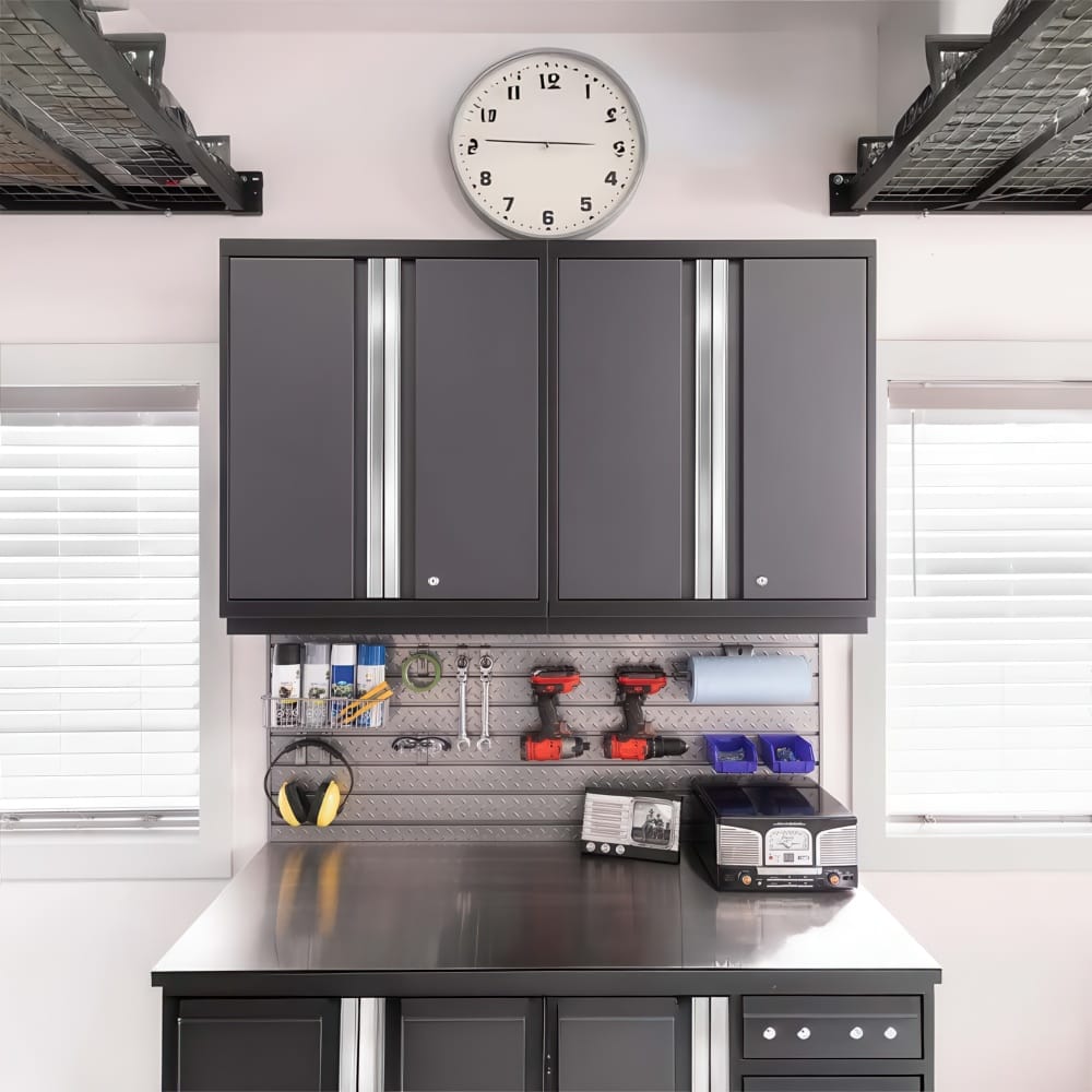 Garage Workstation With Wall Clock Over Grey Cabinets And Pegboard Organizing Tools Above A Stainless Steel Worksurface
