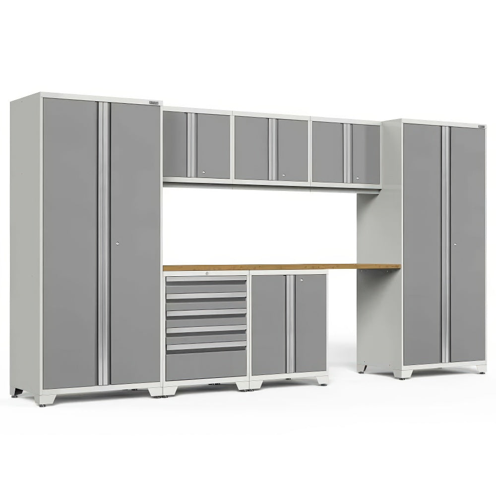 Gray Garage Storage System Combines Tall Cabinets A Wooden Work Surface Upper Wall-Mounted Units And Multi-Drawer