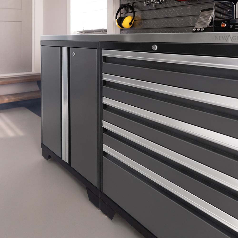 Grey Metal Workbench Cabinet With Multiple Drawers In A Modern Garage
