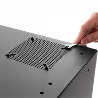 Hand Using Wrench To Tighten Bolt On Black Metal Cabinet With Perforated Ventilation Panel