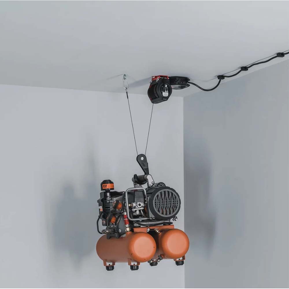 Home Garage Electric Lift By SmarterHome With An Engine And Three Orange Tanks Suspended From The Ceiling By A Cable Controlled By A Unit