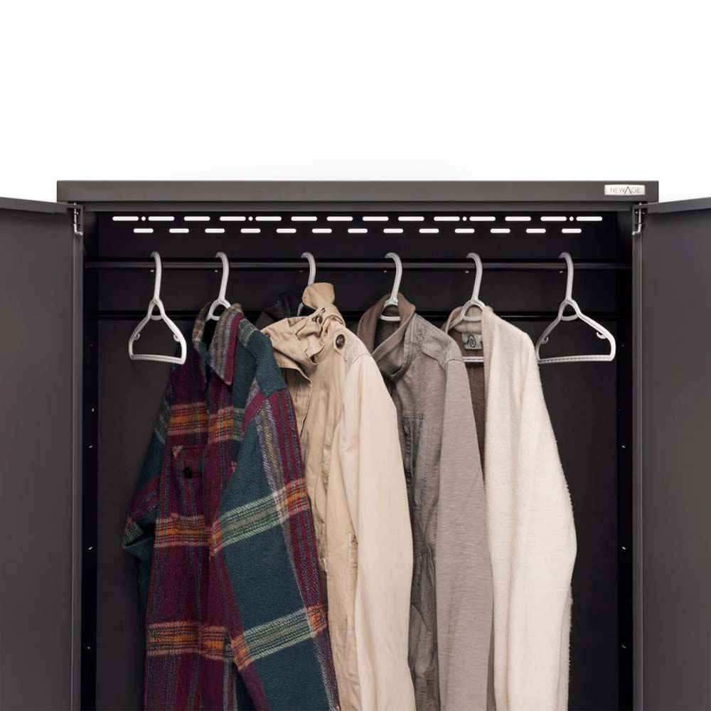 Interior Of A Tall Storage Cabinet With The Doors Open Revealing A Clothing Rod Holding Several Garments On Hangers