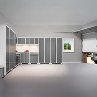L Shaped Grey Cabinet System Along The Wall And An Open Overhead Door Showing A Parked SUV