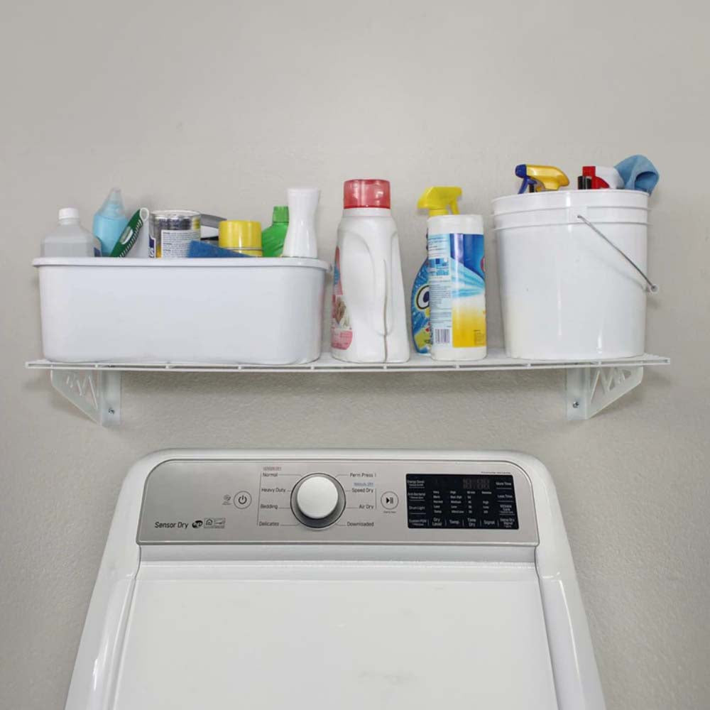 Laundry Room Setup With A White Washing Machine Below A SafeRacks 12x36 Wall Shelves