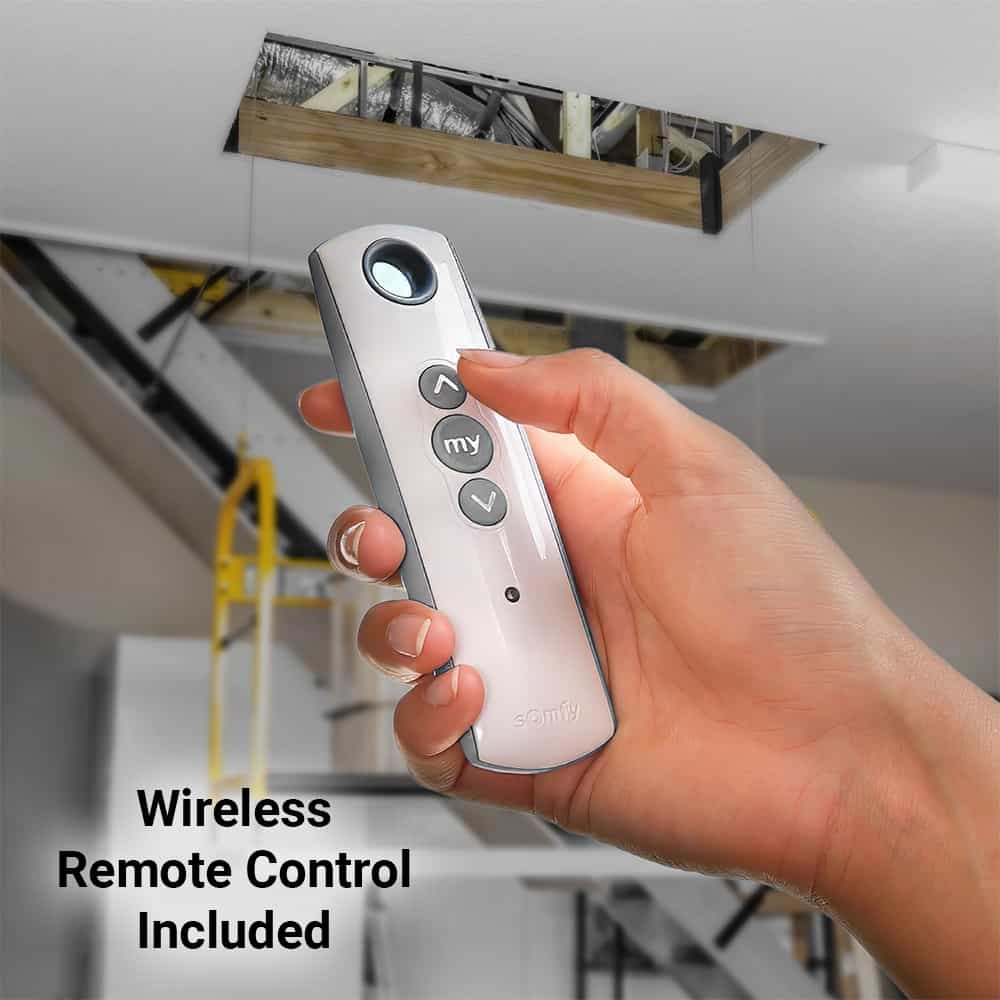 Hand holding the wireless remote included with the Majic Attic Lift