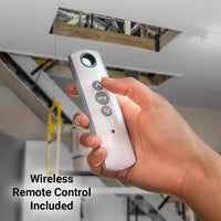 Hand holding the wireless remote included with the Majic Attic Lift