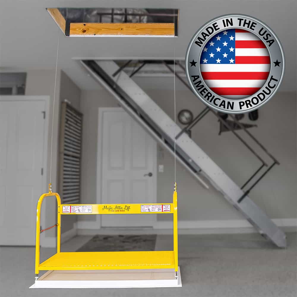 Majic Attic Lift lowered to a garage floor, with a Made in the USA badge