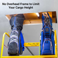 Majic Attic Lift carrying two golf bags up through the ceiling opening