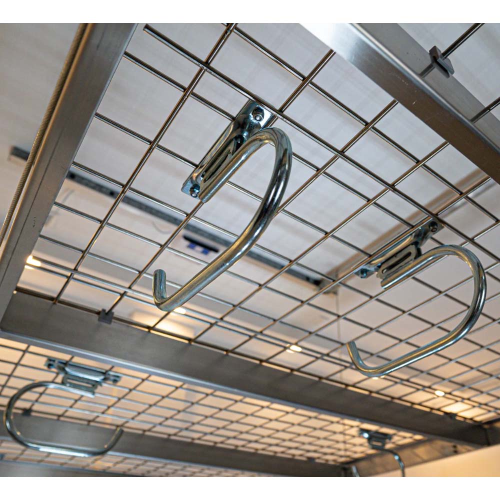 Metal Grid Ceiling Rack With Several Auxx-Hook Attached For Hanging Items