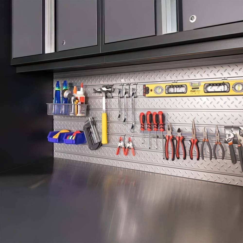 Metal Slatwall Workstation Features Labeled Bins Hanging Hand Tools A Yellow Level And A Stainless Countertop