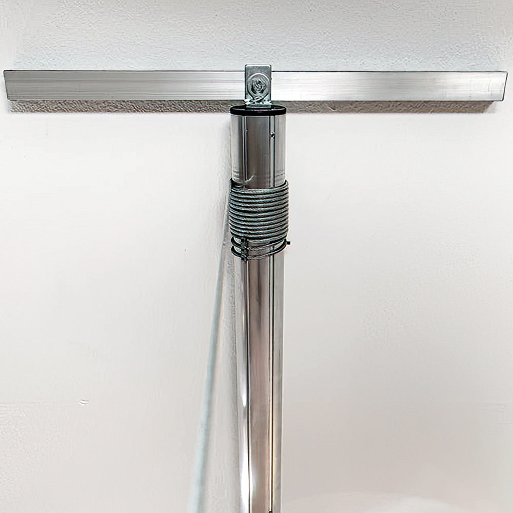 Metallic Pole With Coiled Cables Around Its Top End Secured Under A Horizontal Metal Bar