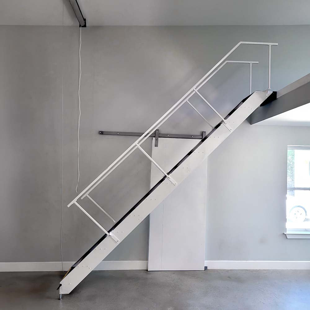 Minimalist White Metal Staircase Rising To A Loft Level Inside A Modern Open Interior