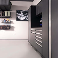 Modern Garage Interior Featuring NewAge 3 Piece Wall Cabinet Set Pro 3.0 Series With 56 Integrated Display Shelf