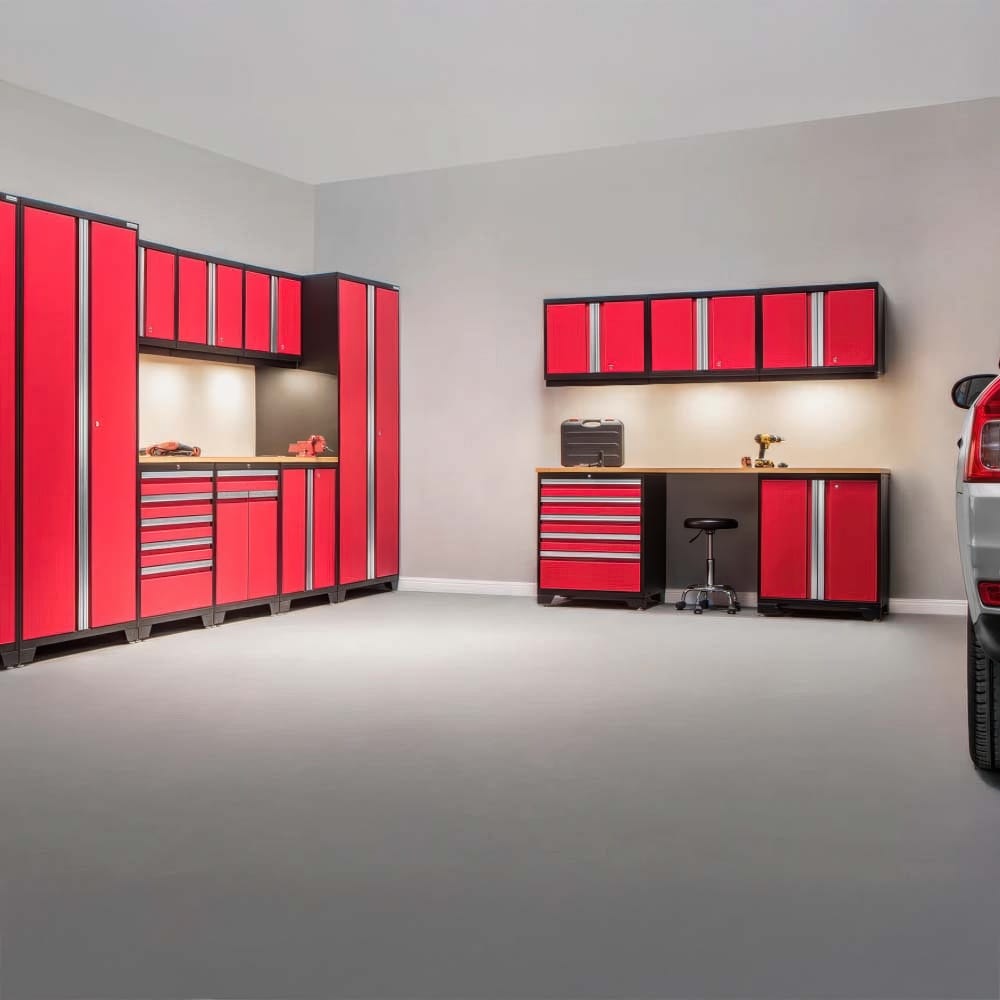 Modern Garage With Bright Red Cabinetry Workbenches Overhead Cabinets And A Parked Car At Right