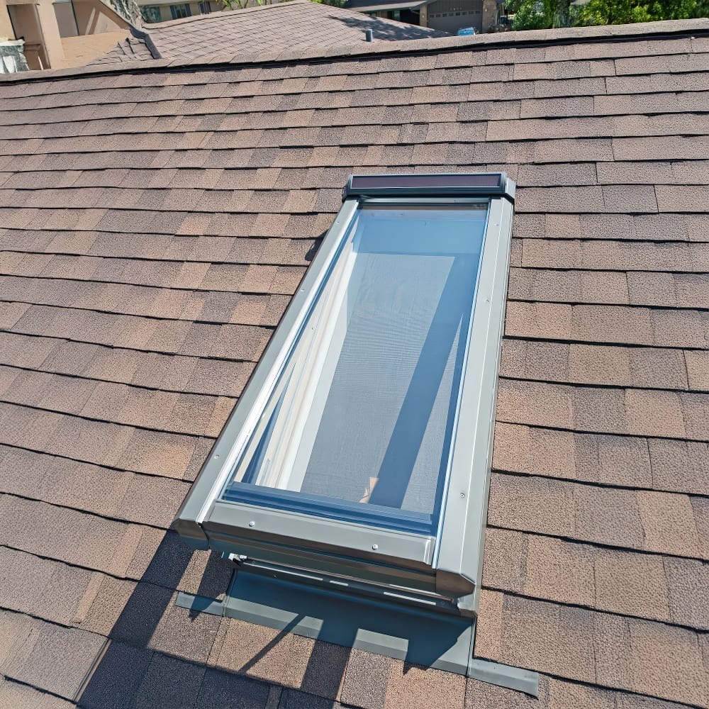 Modern Roof Skylight Installed On Asphalt Shingle Roof For Natural Light And Ventilation