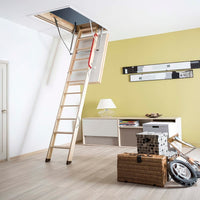 Modern Room With A Fully Extended Wooden Attic Ladder Leading Up To A Ceiling Hatch