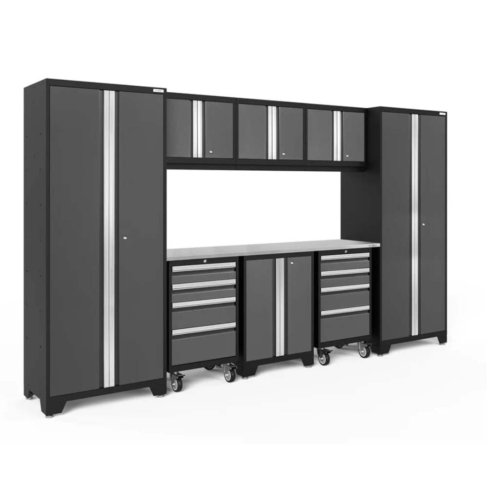Modular Garage Storage System Featuring Tall Cabinets Overhead Cabinets Tool Drawers On Caster Wheels And A Central Workspace