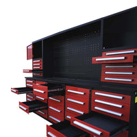 Modular Workstation With A Center Pegboard Backpanel And Multiple Drawers Pulled Open