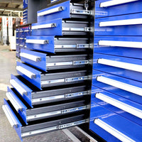 Multiple Blue Drawers Are Pulled Open On A Tool Cabinet Revealing Full Extension Metal Slides