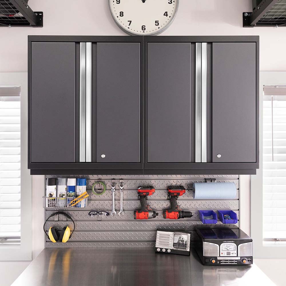 NewAge Garage Cabinet Set Pro 3.0 8 Piece With Tool Cabinets Above A Metal Pegboard Displaying An Array Of Tools And Equipment
