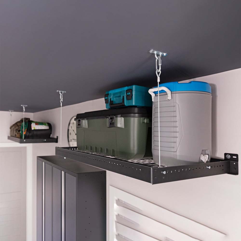 NewAge Garage Overhead Rack Holding Storage Containers A Cooler And Other Items With The Shelves Suspended By Metal Cables And Brackets