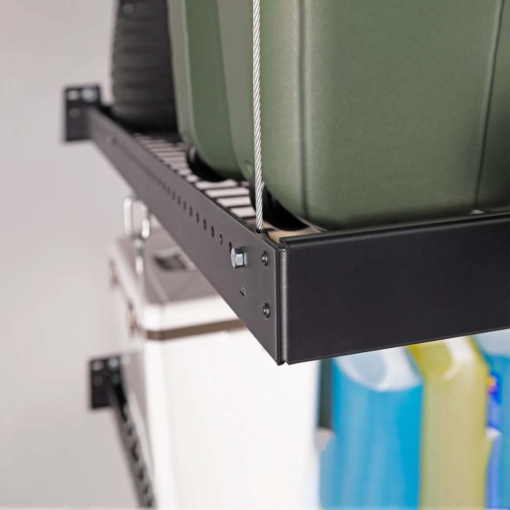 NewAge Pro Series 4 Ft X 8 Ft Wall Mounted Steel Shelf Holding Several Green Storage Bins Supported By Metal Cables And Mounted Brackets